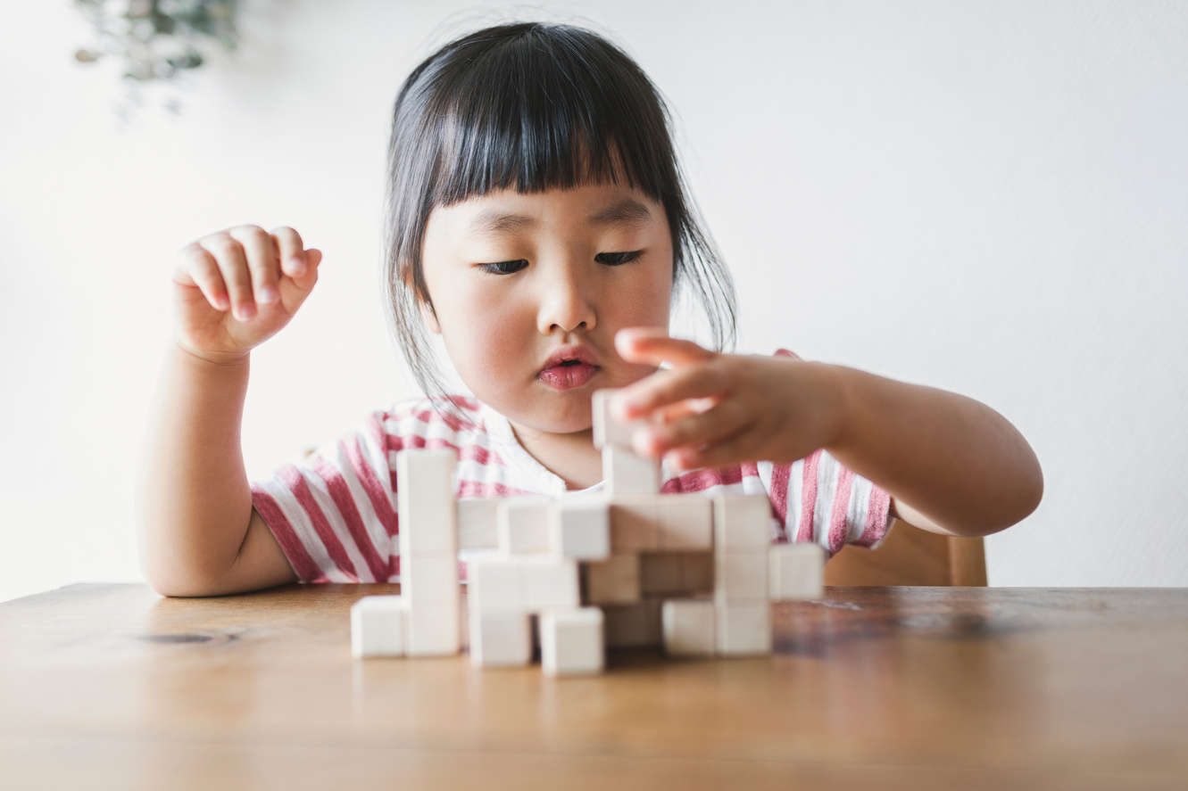 Girl playing with blocks