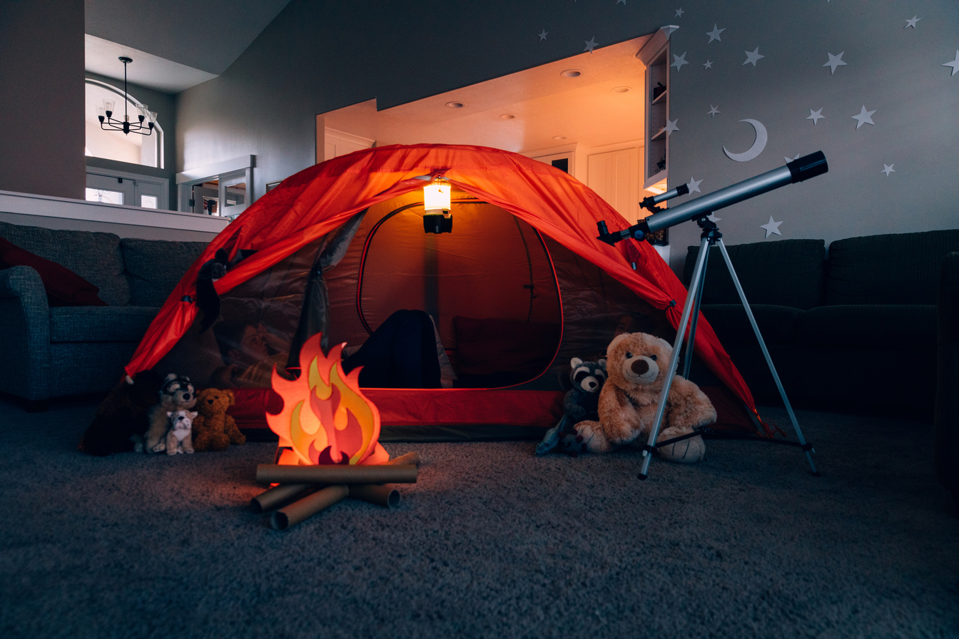 Boy Camping Indoors